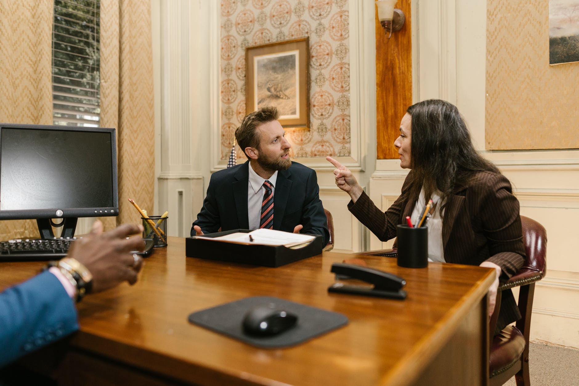 a group people having a meeting inside the office